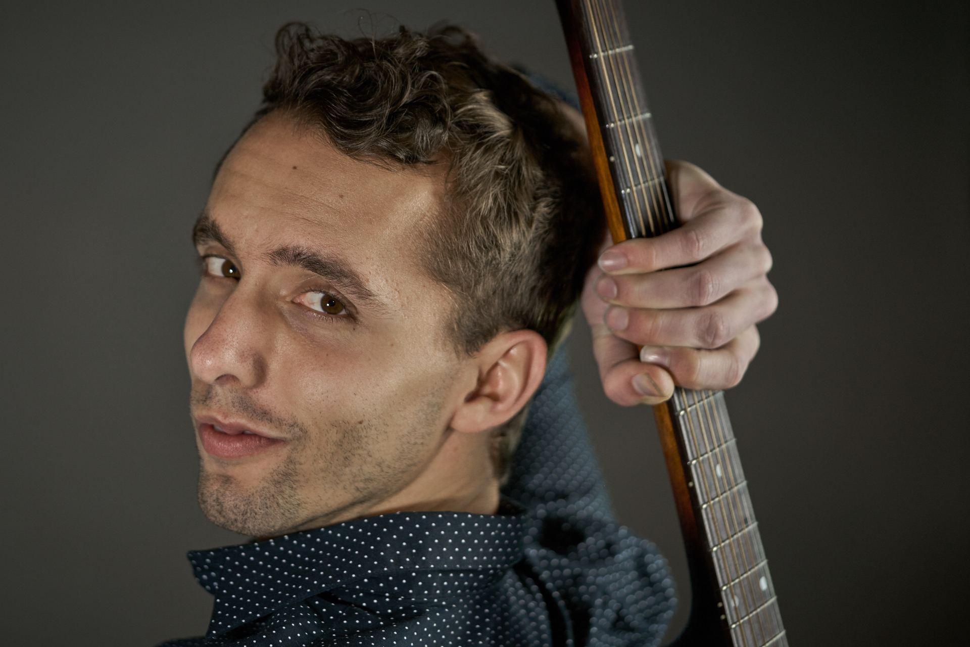 Ben Tschirgi with guitar